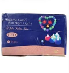 Battery LED Tealight Candle Economical Pack of 24 - Warm Yellow Light Decor Candle