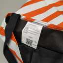 orange striped duffel bag