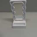 Orbit Wavy LED Light and Mirror Phone Holder is a Multifunctional Phone Stand Featuring a Vibrant LED Glow, a Built-in Mirror