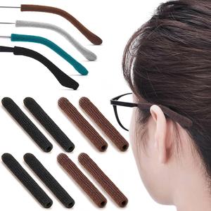 4 Pairs Eye Glasses Ear Grippers, Soft Knitting Cotton Arm Cushion for Glasses Behind Ear, Anti Slip Eye Glass Ear Grips, Non Slip Ear Pads for Glasses, Eyeglasses Temple Tips for Pain (Black&Brown)