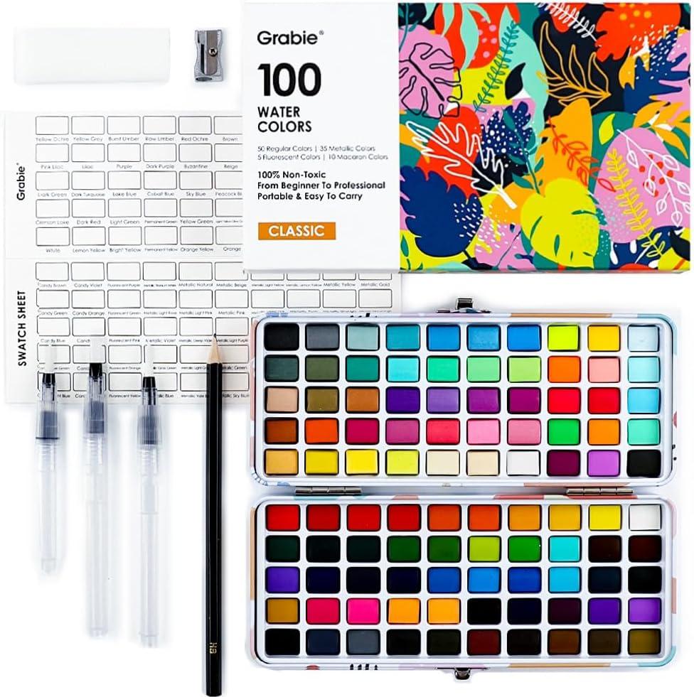 Grabie 100 Colors Watercolor Paint Set - 50 Regular, 35 Metallic, 10 Macaron and 5 Fluorescent Colors - Portable with Carrying Case, Water Brush Pens, and Accessories - For Beginners and Professionals