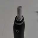 Oral-B iO Deep Clean + Protect Rechargeable Electric Toothbrush, Black with a iO Series 7 Toothbrush, 2 Replacement Brush Heads, and a Charging Travel Case
