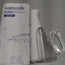 Waterpik Cordless Pulse Rechargeable Portable Water Flosser for Teeth, Gums, Braces Care and Travel with 2 Flossing Tips, Waterproof, ADA Accepted, WF-20 White 