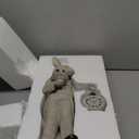 K&K Interiors 20336A 18 Inch Resin Gray and Black Bunny Holding Clock