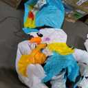 nflatable arch with snowman soldiers on both ends and a polar bear, blue snowflake, and cute Santa penguin in the middle of the archway