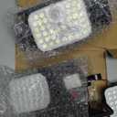 2 Pack Clip on Solar Motion Lights Outdoor with Remote Control, Solar Security Light with 3 Modes, IP65 Waterproof Flood Lights Outside for Garden Patio Garage Backyard