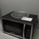 Farberware 1.1 Cu. Ft. Countertop Microwave Oven  1000 Watts Power, Auto Cook Settings, Defrost, Easy Clean and Child Safety Lock - Stainless