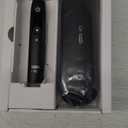 Oral-B iO Series 10 Rechargeable Electric Toothbrush with Visible Pressure Sensor to Protect Gums, 2 Min Timer, 7 Cleaning Settings, 4 Replacement Toothbrush Heads, and Charging Travel Case, Black