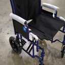 Medline Lightweight Foldable Transport Wheelchair with Handbrakes and 12-Inch Wheels, Blue Frame, Black Upholstery