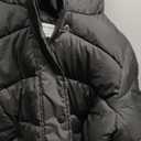 Amazon Essentials Women's Heavyweight Quilted Long-Sleeve Hooded Puffer Coat (1X, Black)