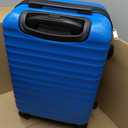 Amazon Basics 21" Hardside Carry-On Luggage with Expandable Space, Scratch-Resistant Surface, Telescoping Handle, Four Multi-directional Wheels, Light Blue