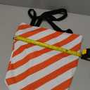 orange striped duffel bag