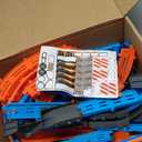 Hot Wheels City Track Set with 1 Toy Car, Race Through a Giant Loop to Defeat a Big Dinosaur, T-Rex Loop Stunt and Race Playset