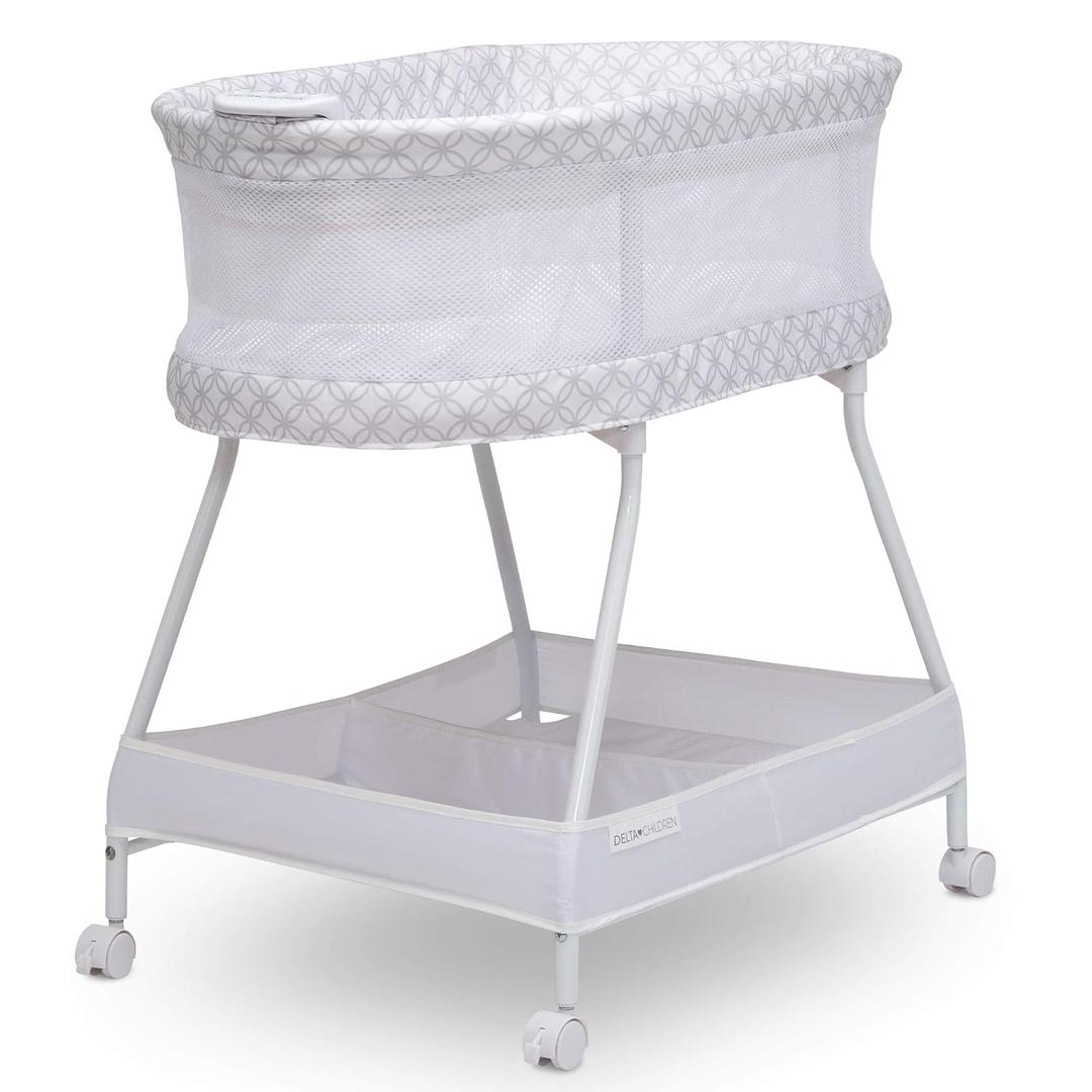Delta Children Sweet Dreams Bassinet with Airflow Mesh Bedside Portable Crib with Vibration Lights and Music, Grey Infinity