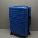 Amazon Basics 26" Hardside Medium Checked Luggage, Expandable For Up to 15% More Space, With Scratch-Resistant Surface, Four Multi-directional Wheels, Light Blue