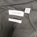 Calvin Klein Boys' Long Sleeve Slim Fit Dress Shirt, Button-Down Style with Cuffs & Shirttail Hem (Black, 16)