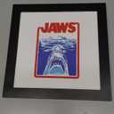 Trends International Gallery Pops Jaws - 50th Anniversary Shark Badge Wall Art, 12" x 12" Gallery Pops Wall Art, Black Framed Version
