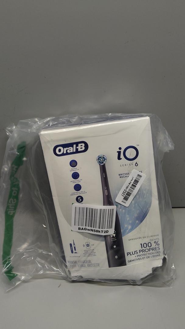 OralB iO Series 6 Rechargeable Electric Toothbrush with Visible Pressure Sensor to Protect Gums, 2 Minute Timer, 5 Cleaning Settings, 1 Replacement Toothbrush Head, and Travel Case, Black