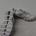 Mizuno Women's Wave Prophecy 4 Running Shoe (6, White/Metallic Grey)