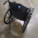 Medline Comfortable Folding Wheelchair with Swing-Back, Desk-Length Arms and Elevating Footrests, 20”W x 16”D Seat