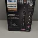 Philips Sonicare DiamondClean Smart 9300 Electric Toothbrush, Sonic Toothbrush with App, Pressure Sensor, Brush Head Detection, 4 Brushing Modes and 3 Intensity Levels, Black, Model HX9903/15