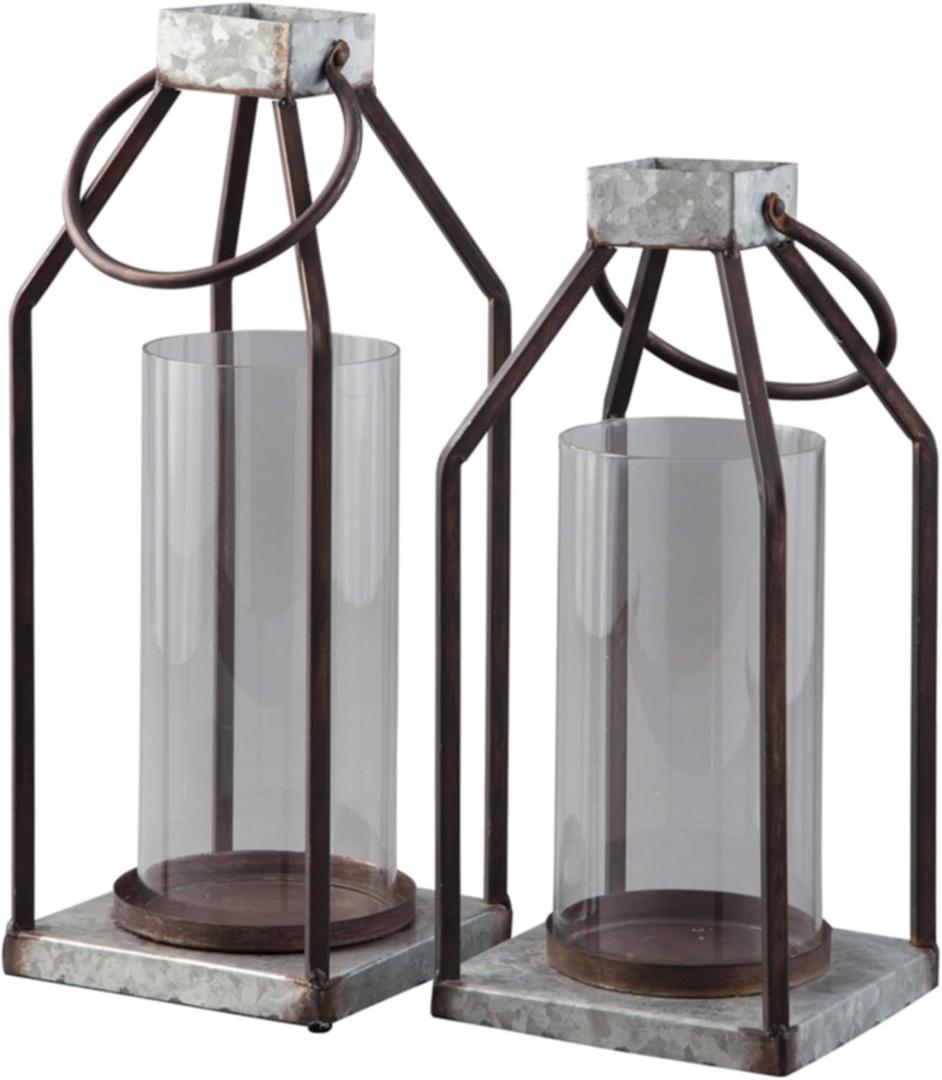 Signature Design by Ashley Diedrick Rustic Lantern, Set of 2, Indoor/Outdoor, Galvanized Metal, Antiqued Finish, Glass Shade, Holds 3 in. Pillar Candles (Not Included), 19" &17", Gray and Black