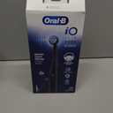Oral-B Rechargeable Electric Toothbrush, iO2 Starter Kit, 3 Cleaning Modes, Automatic Pressure Sensor to Protect Gums, 2 Brush Heads, Night Black