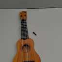 Yardwe Boys and Girls Practice Ukulele Mini Four-String Musical Instrument for Early Education for Toddlers and Young Boy Girl Safe Material Great for Music Learning and Fun Activities