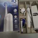 Oral-B Rechargeable Electric Toothbrush, iO Limited Simple Clean, 3 Cleaning Modes, Automatic Pressure Sensor to Protect Gums, Travel Case, White