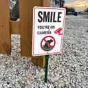 SmartSign 'Smile You're On Camera' Yard Sign with No Dog Poop Symbol - 7" x 10" Sign with Sturdy Stake, 40 mil Aluminum Sign, 21-inch Tall Sign/Stake Kit, Green/Black/White, USA-Made