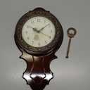 XICHEN Retro European Style Simulated Wood Pendulum Wall Clock,Quartz Motion Design, Plastic Main Structure, Brushed Metallic Gold Paint Surface Texture on The Perimeter