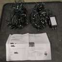 2 Pack 
YEGUO 66ft 200 LED Christmas Lights Outdoor Waterproof, 8 Modes Purple String Lights Plug in, Green Wire Twinkle Tree Lights Indoor with Timer Memory