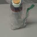 stainless steel water bottles (32 onz, green with brown cap)