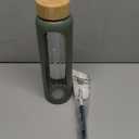 Aqulea Glass Water Bottles 32 Oz with Silicone Sleeve - BPA Free Reusable Wide Mouth Glass Motivational Water Bottles with Fruit Infuser  Leak Proof Borosilicate Water Bottle with Time Marker (Green)