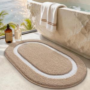 LUMI Oval Bathroom Rug, Absorbent Non Slip Bath Mat, Khaki, 20"x32"
Luxury Oval Shape, Soft Microfiber with Non Slip Backing, Quick Dry, Machine washable for Bathtub, Shower, Sink, Laundry