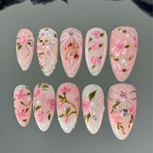 24Pcs Pink Flower Press on Nails Medium Almond Fake Nails with Peach Blossom Rhinestones Pearl Design Handmade False Nails 3D Floral Gems Bow Glue on Nails Rose Artificial Acrylic Nails Kit for Women