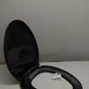 Renovators Supply Manufacturing Black Plastic Soft Close Elongated Toilet Seat Quiet-Close Lid, Contoured Seat Easy To Install And Clean, Grip-Tight Bumpers With Adjustable Mounting Hardware (Pack of 1)