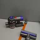 Casdon Dyson Cordless Vacuum Interactive & Officially Licensed Toy Dyson Vacuum For Children Aged 3+ Realistic Role-Play Fun, Purple and Orange