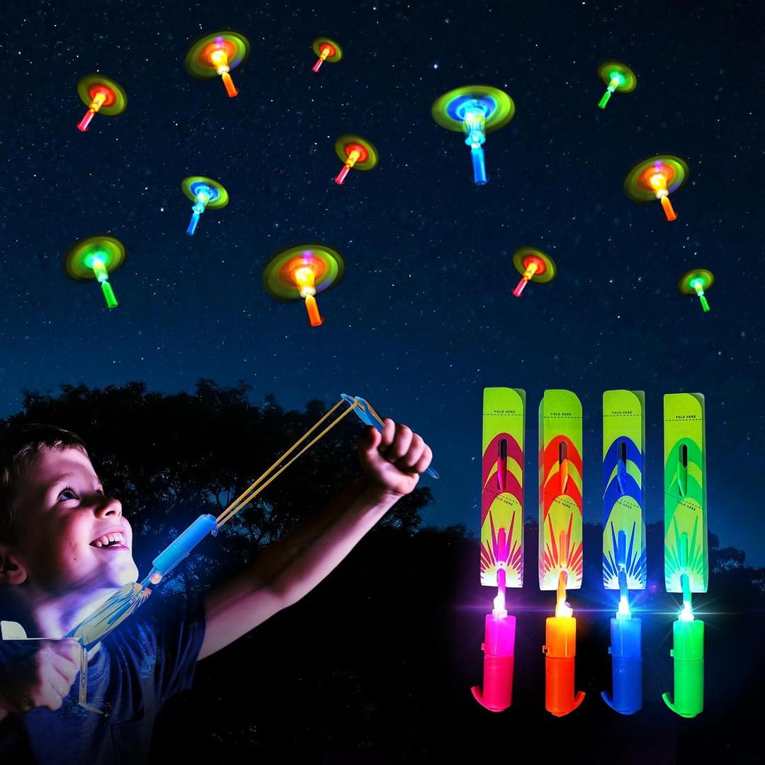 25 Pack LED Flying Toys Set with Whistle,25 Rocket Slingshot+25 Glow Arrow Helicopter for Outdoor Camping Glow in The Dark Party Supplies Flying Outdoor Toys Game LED Slingshot Toy for Kids 8-12,4-8