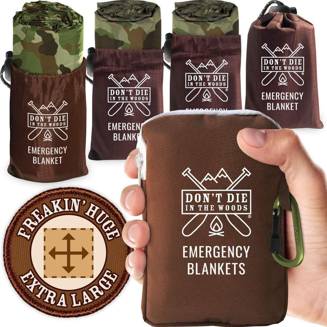Don't Die In The Woods - Freakin Huge Emergency Blankets [4-Pack] Extra-Large Thermal Mylar Space Blankets with Ripstop Nylon Stuff Sacks + Carabiner Zipper Pack [Woodland Camo]