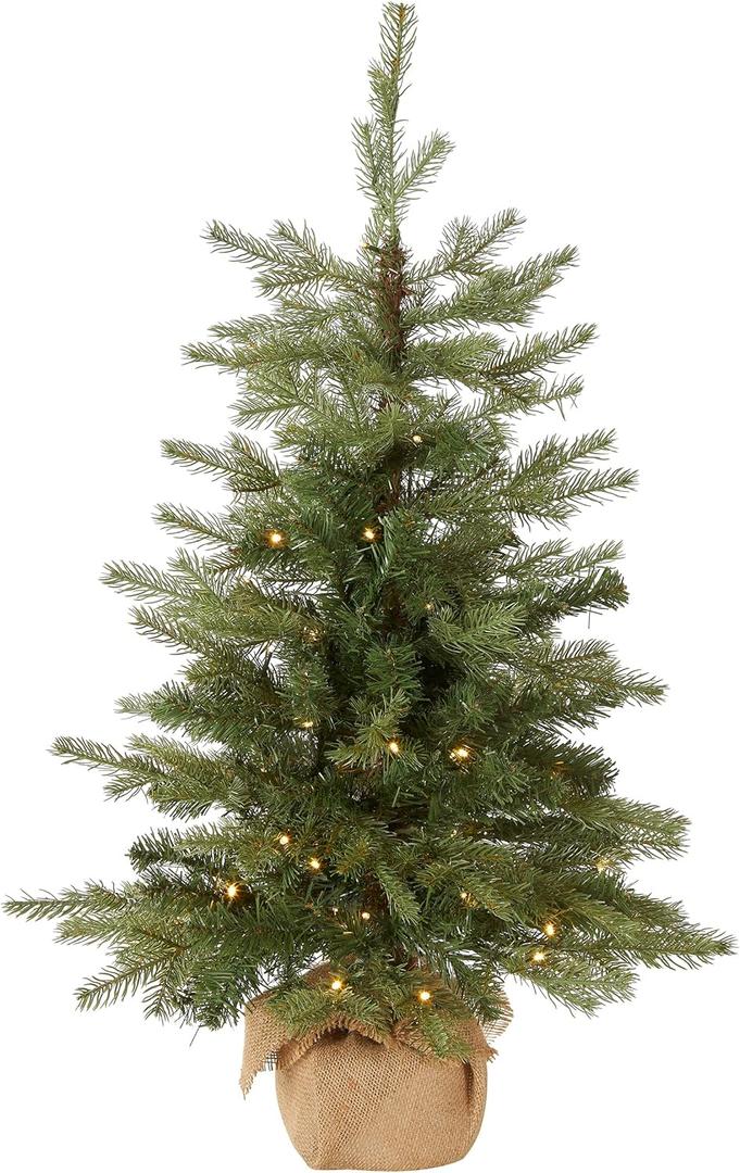 National Tree Company 3 ft Pre-Lit Nordic Spruce Mini Artificial Christmas Tree, Burlap Base, Red Bow, 50 Clear LED Lights, 363 Tips, Timer, Green