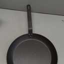 Lodge Pre-Seasoned Carbon Steel Skillet - Use in the Oven, on the Stove, on the Grill, or Over a Campfire - 10 Inch