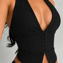 Black halter-neck corset-style top with a deep V-neckline and front hook-and-eye closure, Large