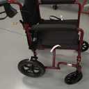 Medline Lightweight Foldable Transport Wheelchair with Handbrakes and 12-Inch Wheels, Red Frame, Black Upholstery
