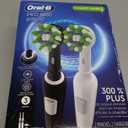 Oral-B Pro 1000 CrossAction Electric Toothbrush, Black and White, 2 Count