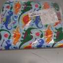 Lusso Gear Kids Airplane Tray Table Cover - Storage Pockets for Toddler Toys & Snacks - Kids Travel Essentials & Organizer - Portable Fit for Most Airplane Trays - Dinos