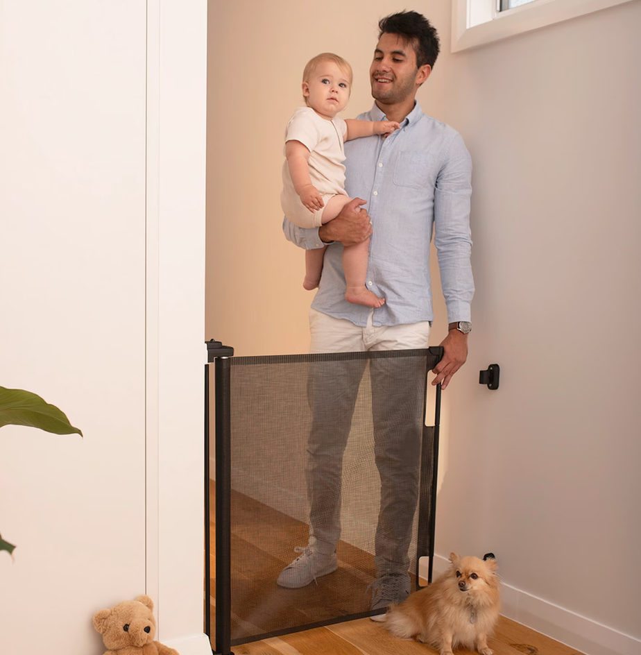 Perma Child Safety 55 in. Wide x 33 in. Tall Black Retractable Baby Gate