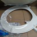 KOHLER 20111-96 Brevia, Slow Close Toilet Seat, Round Toilet Seat, Grip-Tight Bumpers Quick-Attach Hardware, Biscuit