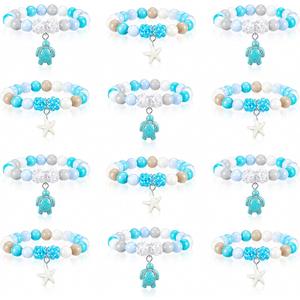 Ecally 12 Pcs Beach Theme Party Favors for Kids Under The Sea Beaded Bracelets Bulk Ocean Party Supplies Summer Turtle Starfish Bracelets for Birthday Princess Goodie Bag Stuffers Prize Gifts