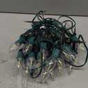 Novelty Lights 25 Ft Vintage LED C9 Warm White Transparent Christmas String Lights – 25 Shatterproof Plastic Bulbs, 12" Spacing Green Wire, Classic Filament Glow, Indoor Outdoor Holiday Lighting